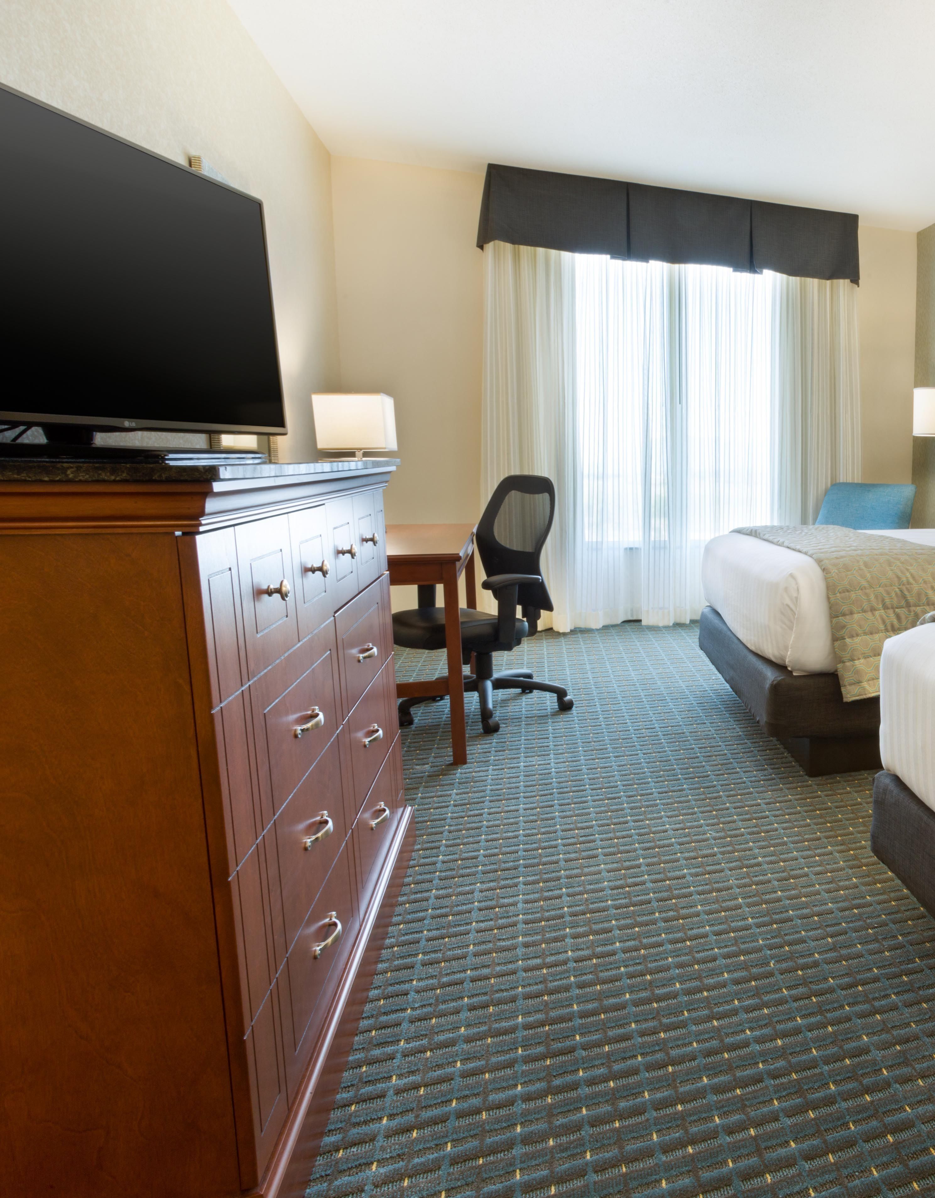 desk, blackout curtains, iron/ironing board, free cots/infant beds