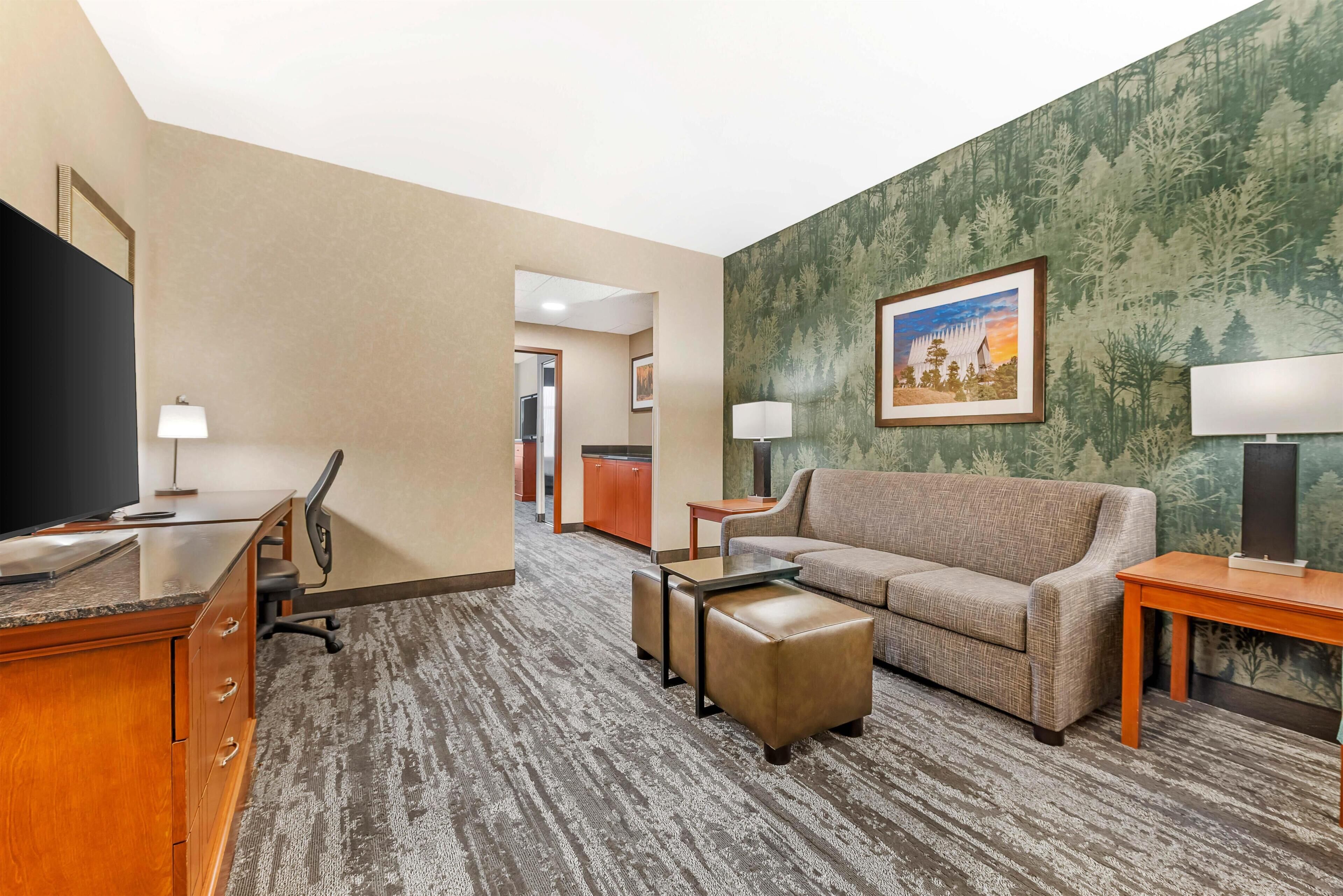 Desk, blackout drapes, iron/ironing board, free cribs/infant beds