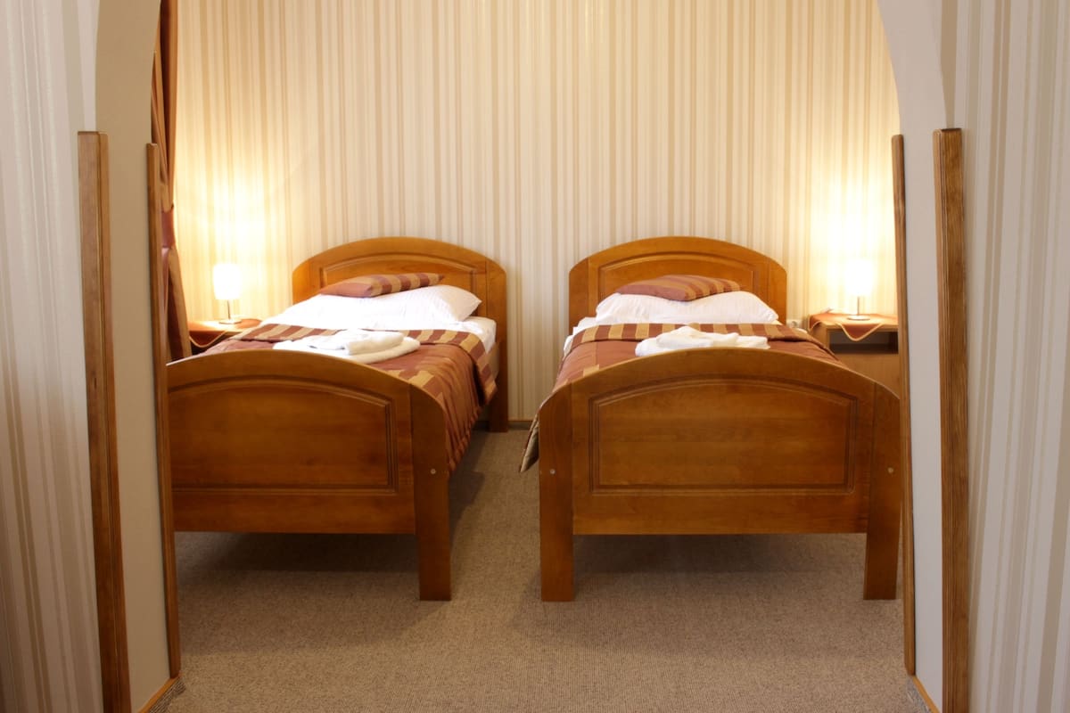 Standard Triple Room, 3 Single Beds, Non Smoking | Premium bedding, in-room safe, iron/ironing board, cots/infant beds