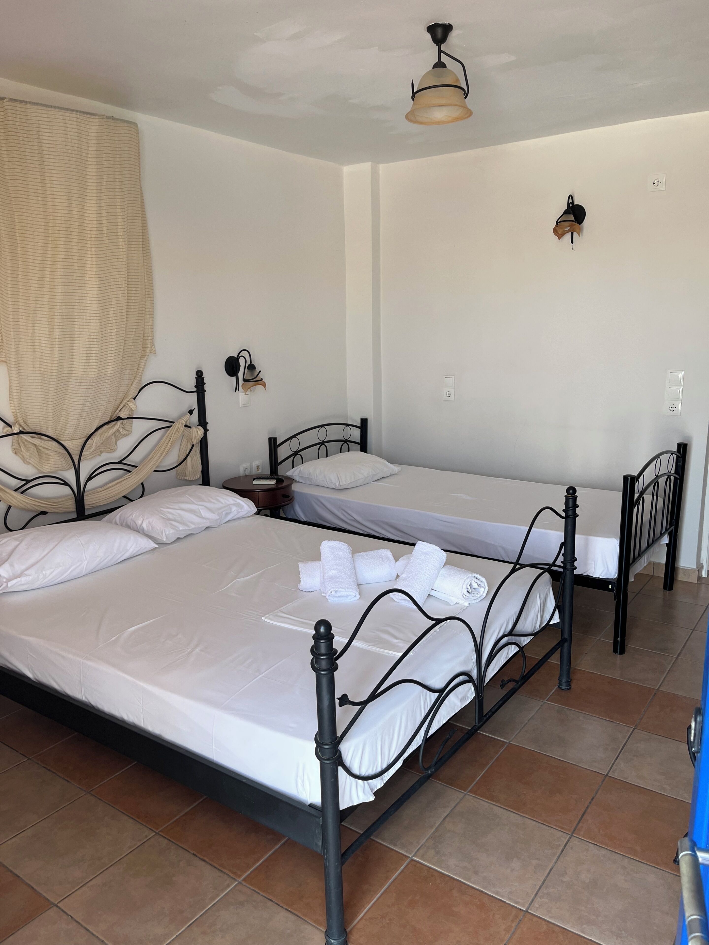 Deluxe Triple Room | In-room safe, individually decorated, iron/ironing board, free WiFi