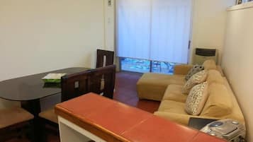 Traditional Apartment, 1 Bedroom | Living area | 19-inch flat-screen TV with cable channels, TV