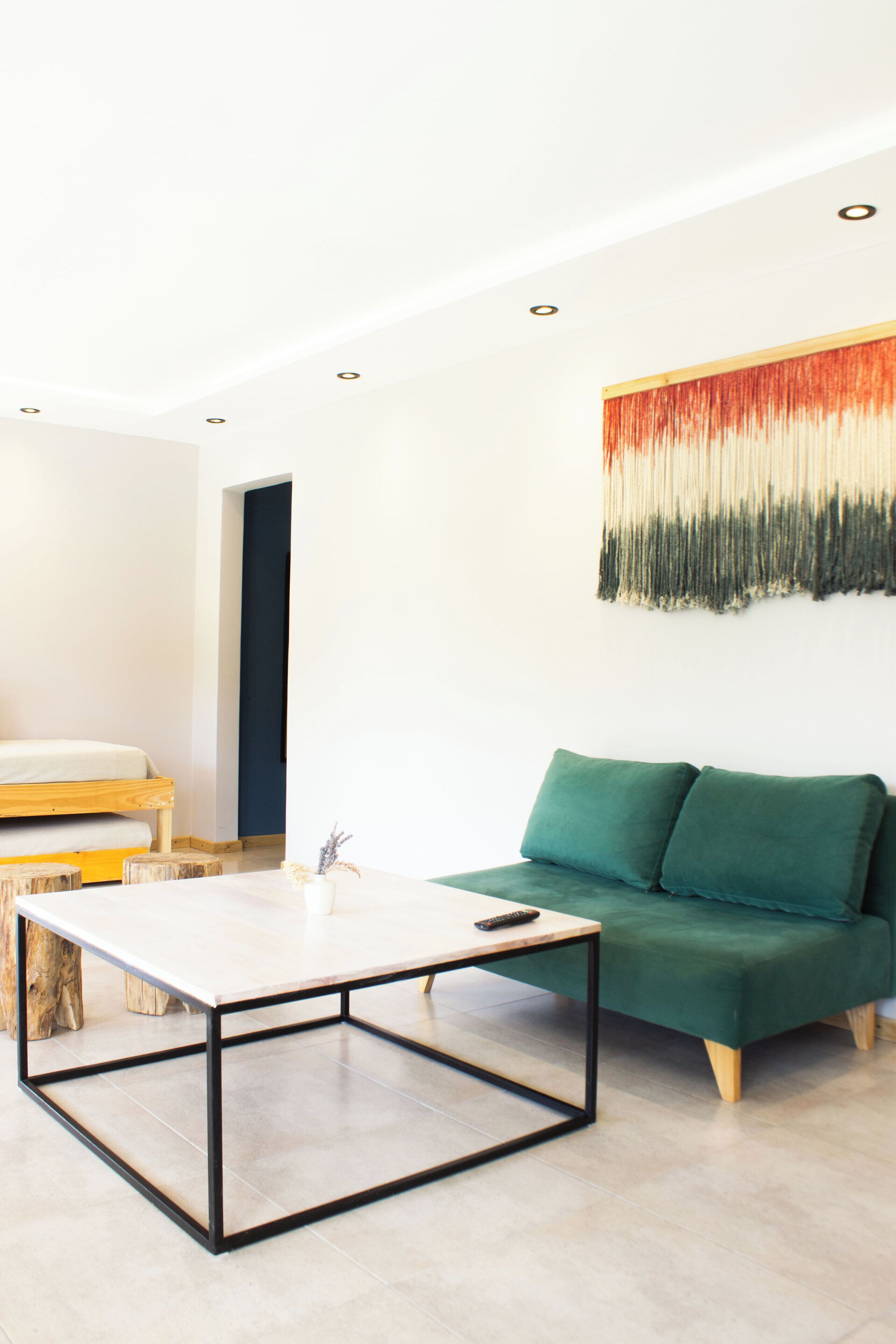 family apartment, 1 bedroom | living area | 32-inch flat-screen tv with satellite channels, tv