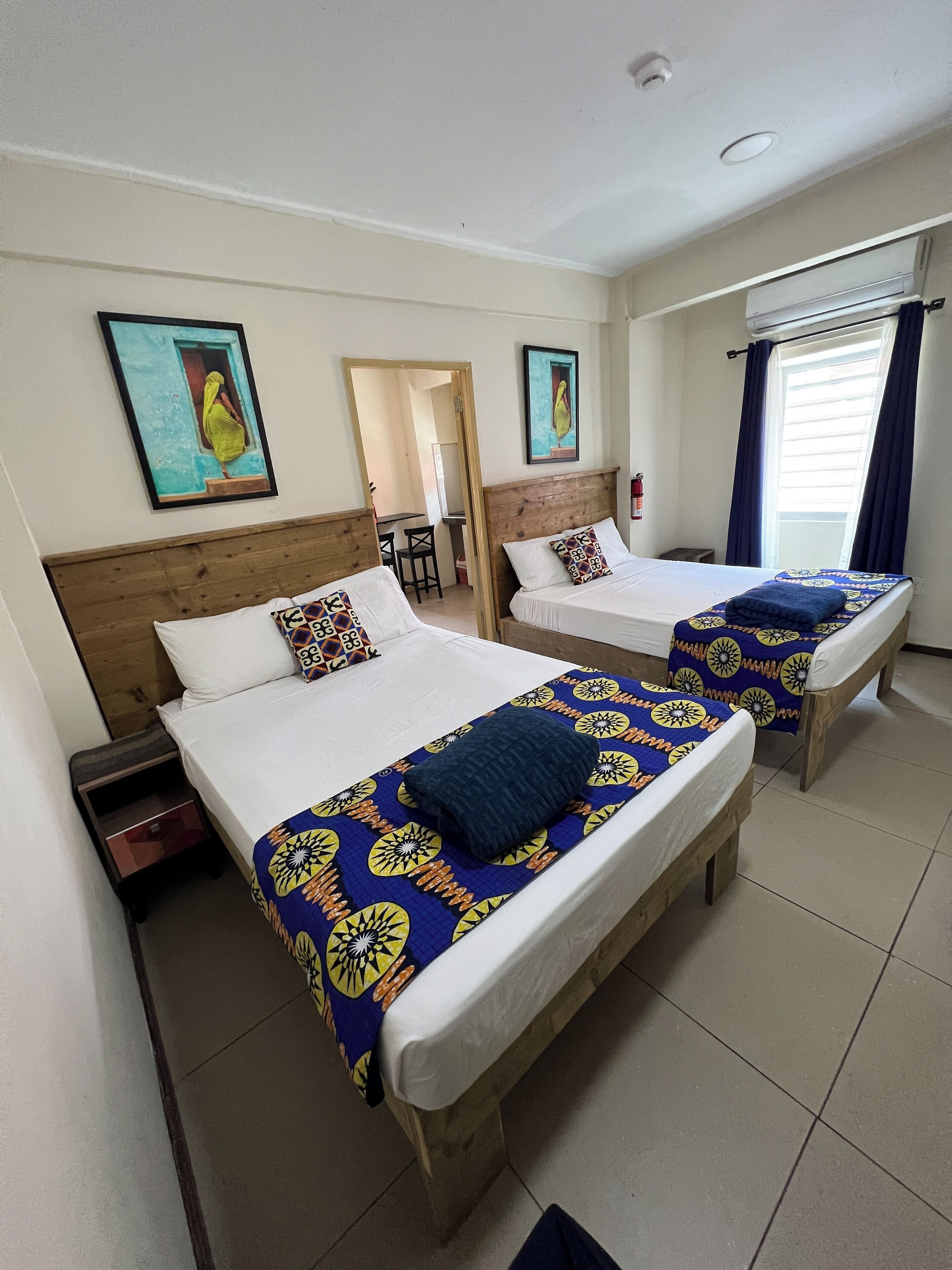 deluxe apartment, multiple beds, non smoking, kitchenette | 1 bedroom, premium bedding, in-room safe, desk