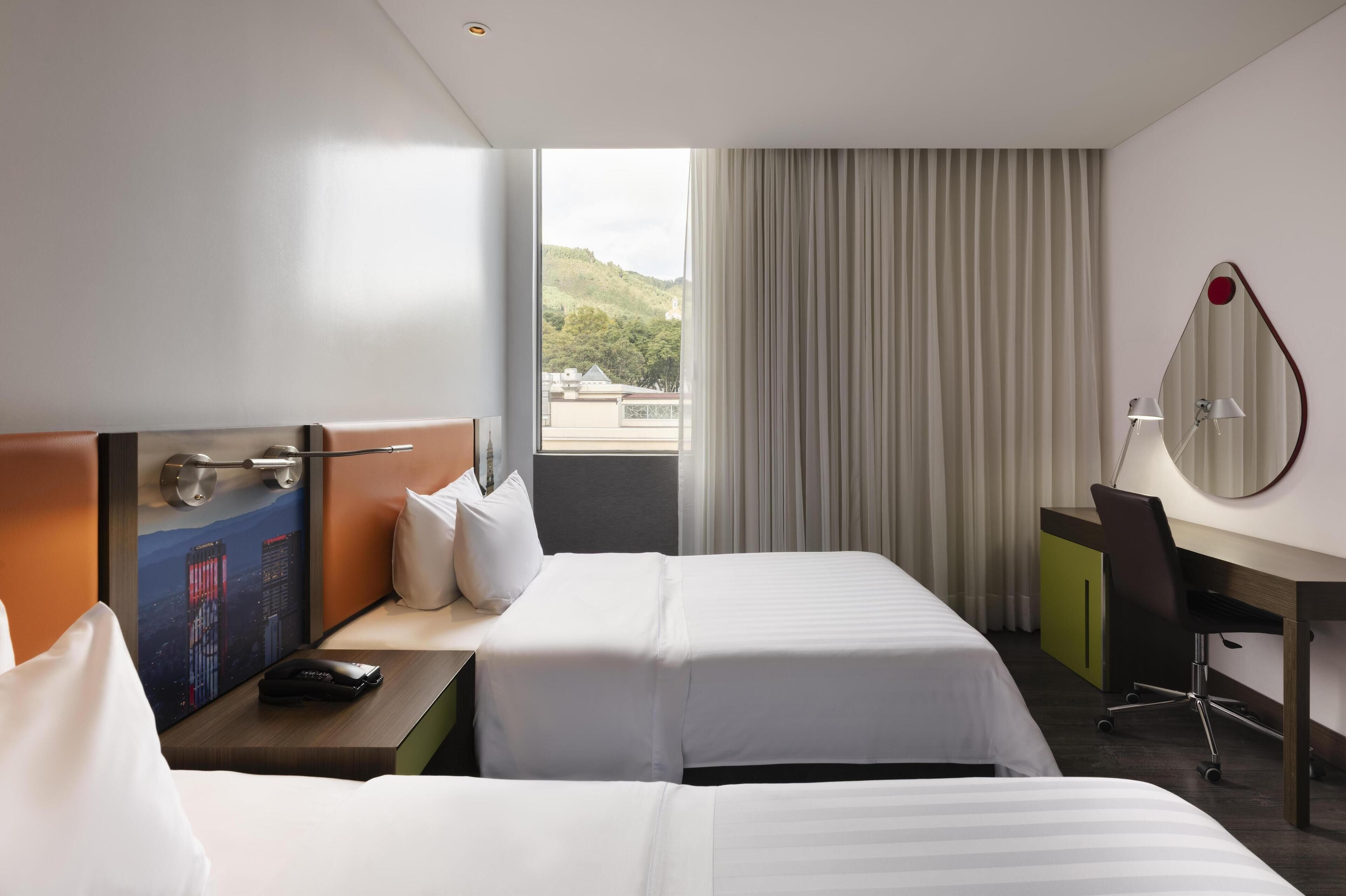 Camera, 2 letti singoli | Una cassaforte in camera, una scrivania, insonorizzazione