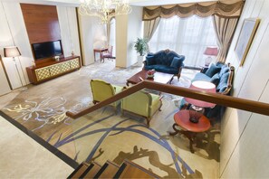 Luxury Duplex, 1 Bedroom, Executive Level | Living area | 48-inch LED TV with satellite channels, TV - Hotels & Preference Hualing Tbilisi (Tbilisi)