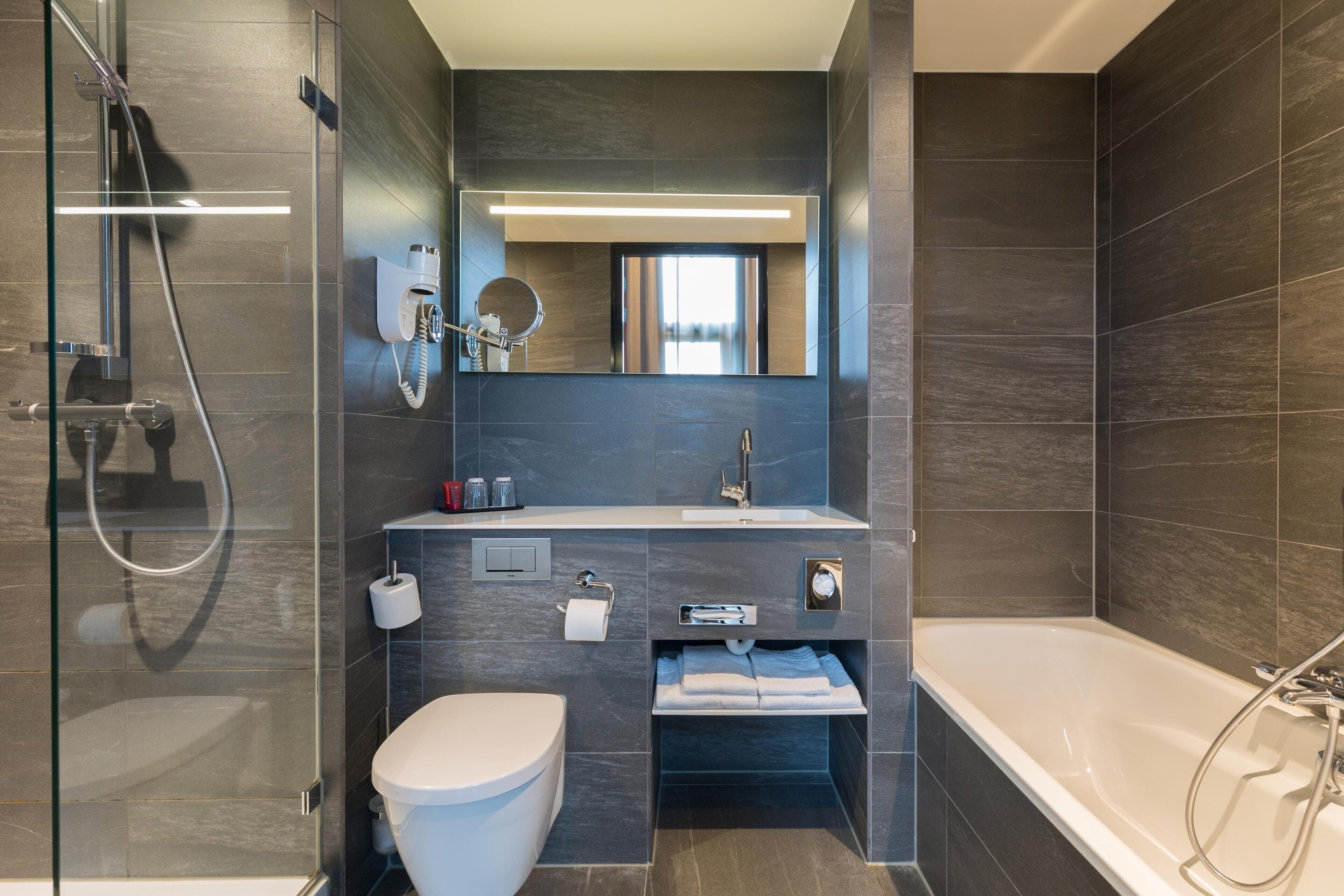 eco-friendly toiletries, hair dryer, towels