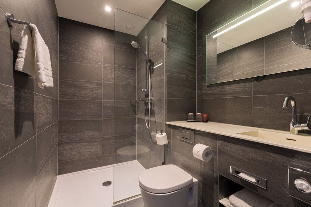 eco-friendly toiletries, hair dryer, towels