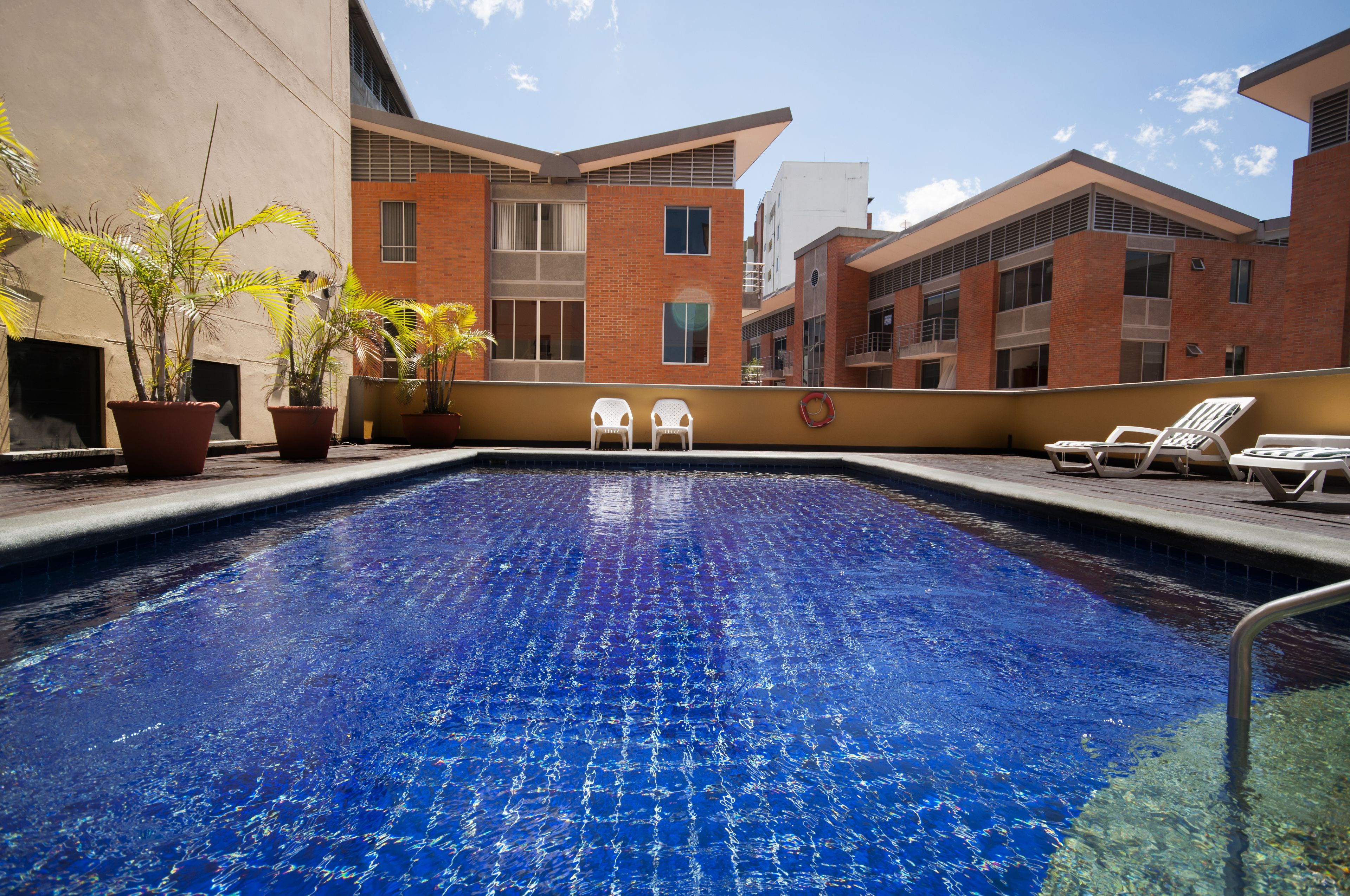 outdoor pool, pool loungers