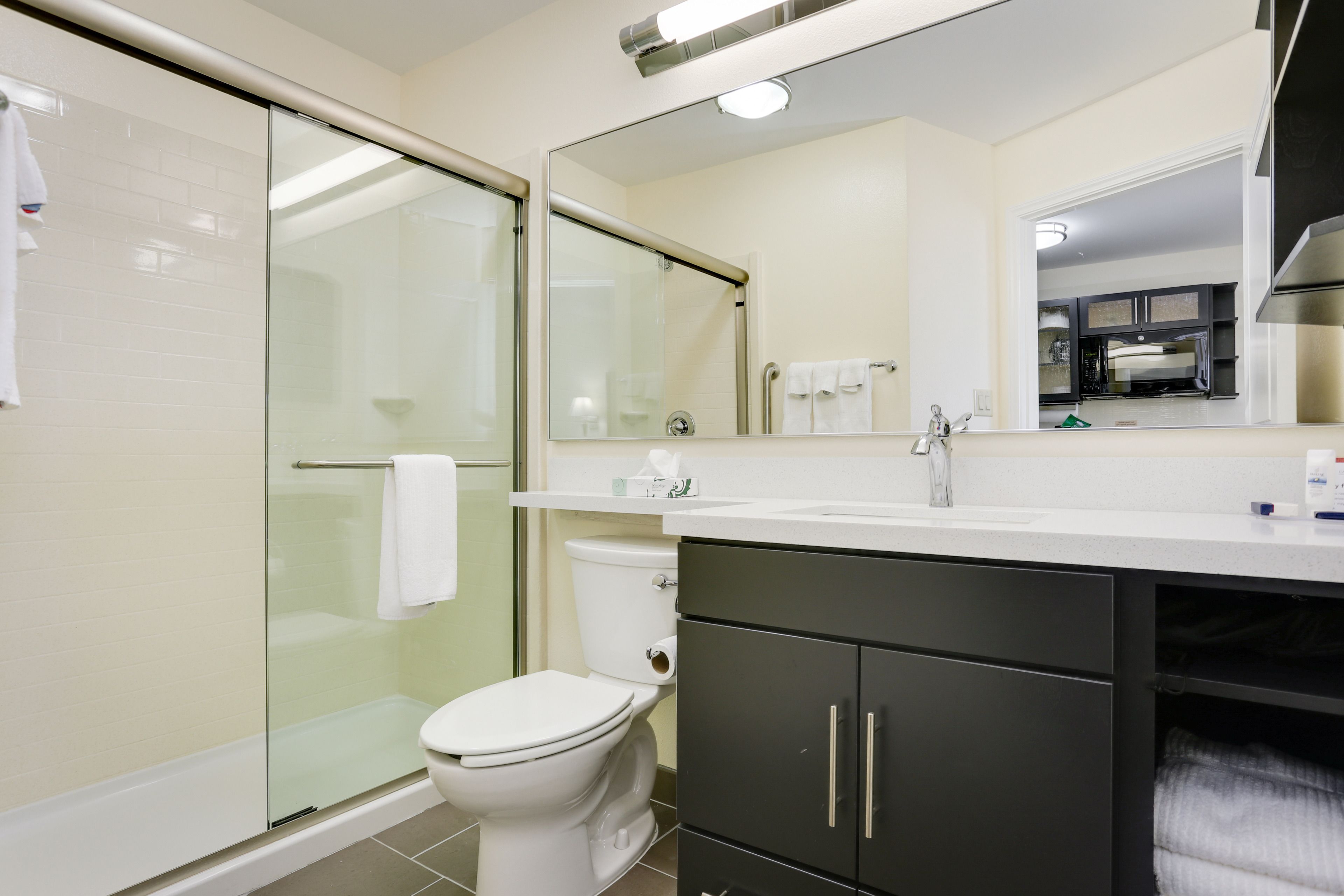 studio suite, 1 queen bed, accessible (communications, mobility, access tub) | bathroom | deep-soaking bathtub, hair dryer, towels