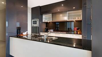 Three Bedroom Apartment | Private kitchen | Full-size fridge, microwave, oven, stovetop