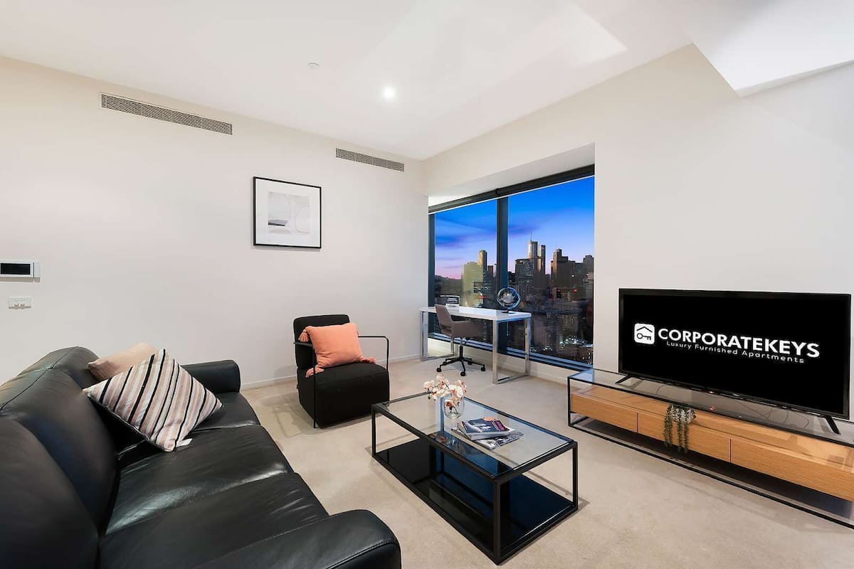 Two Bedroom Apartment | Living area | 42-inch flat-screen TV with satellite channels, TV