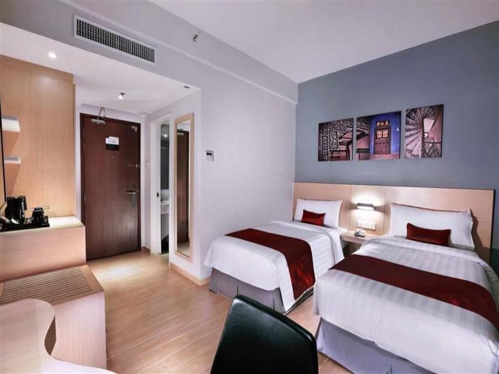 Ropa de cama de alta calidad y minibar 
