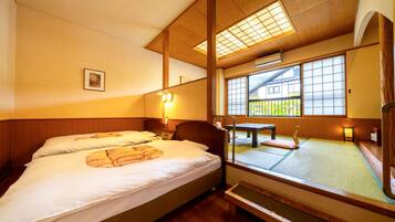 Japanese-Western Style room, 2 Single Beds with Tatami room (27 sqm) | In-room safe, desk, laptop workspace, blackout drapes