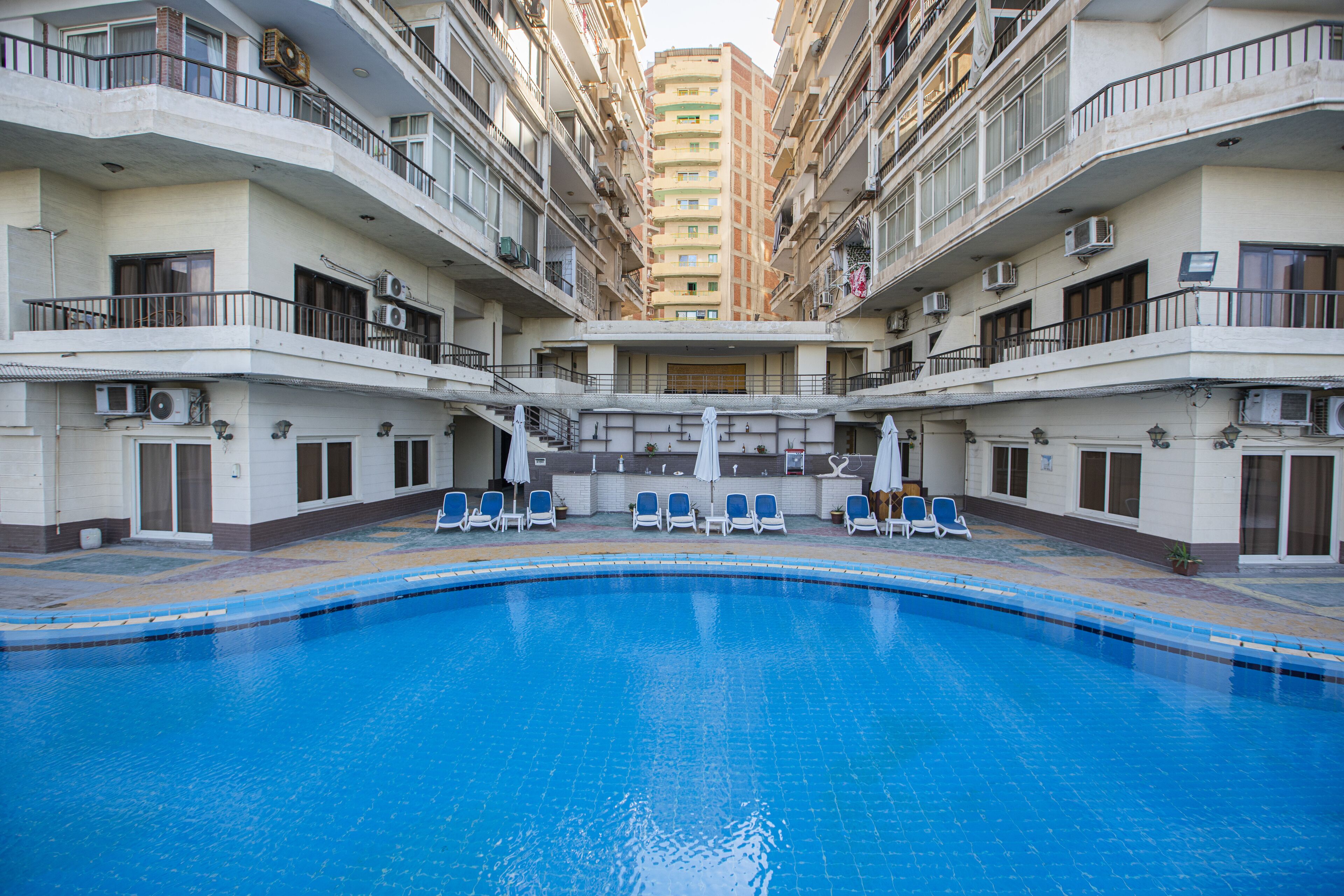 Outdoor pool, pool umbrellas, pool loungers