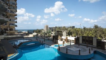 Outdoor pool, pool umbrellas, pool loungers