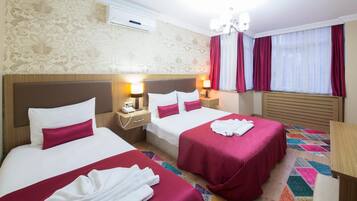 Ropa de cama de alta calidad, minibar, caja fuerte