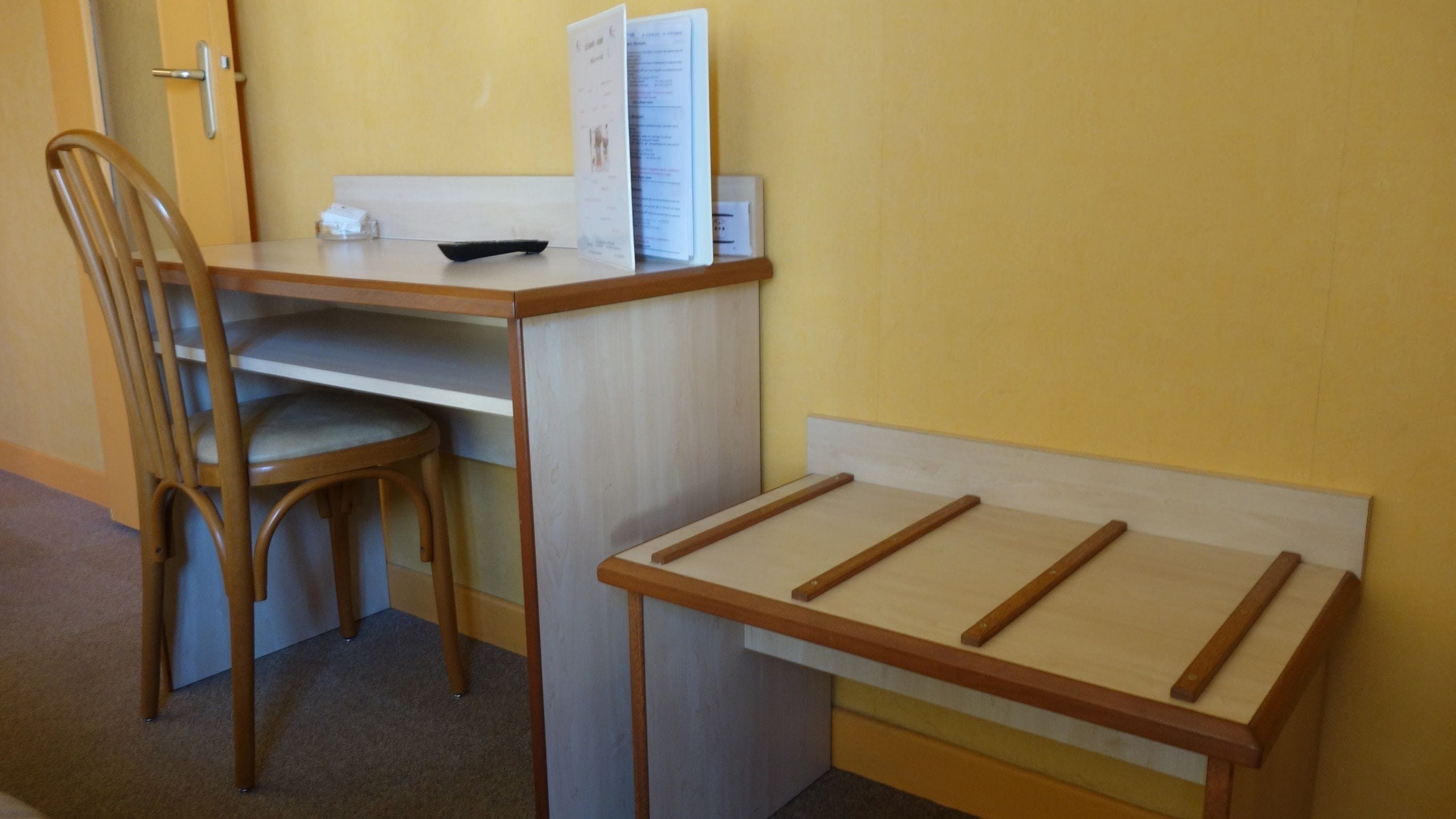 desk, laptop workspace, iron/ironing board, cots/infant beds