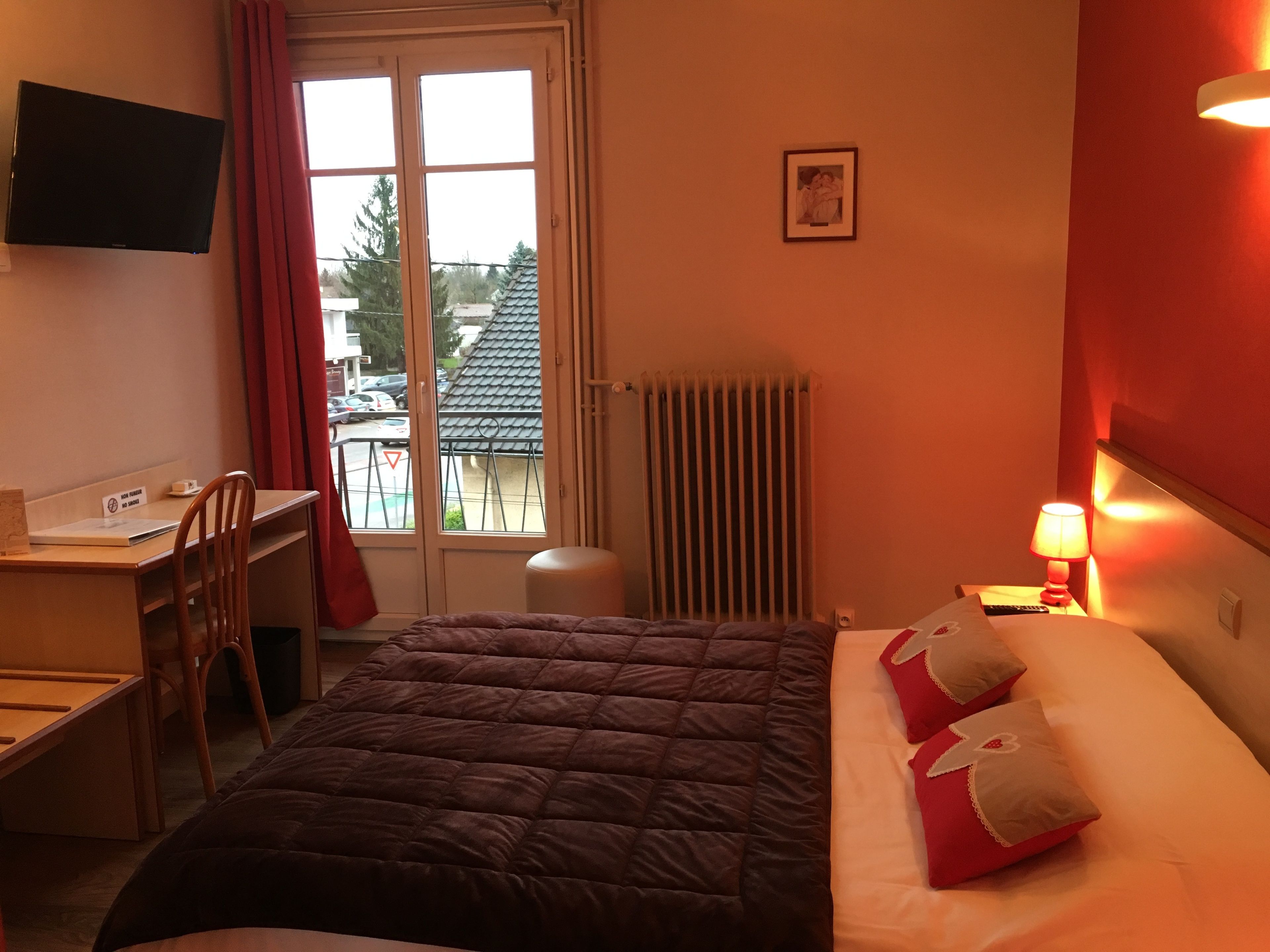 family room | desk, laptop workspace, iron/ironing board, cots/infant beds