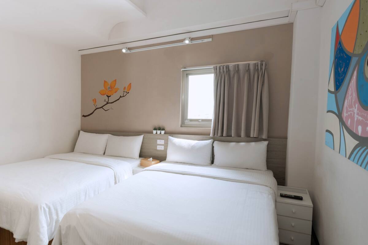 Standard Quadruple Room | Hypo-allergenic bedding available, down comforters, blackout drapes