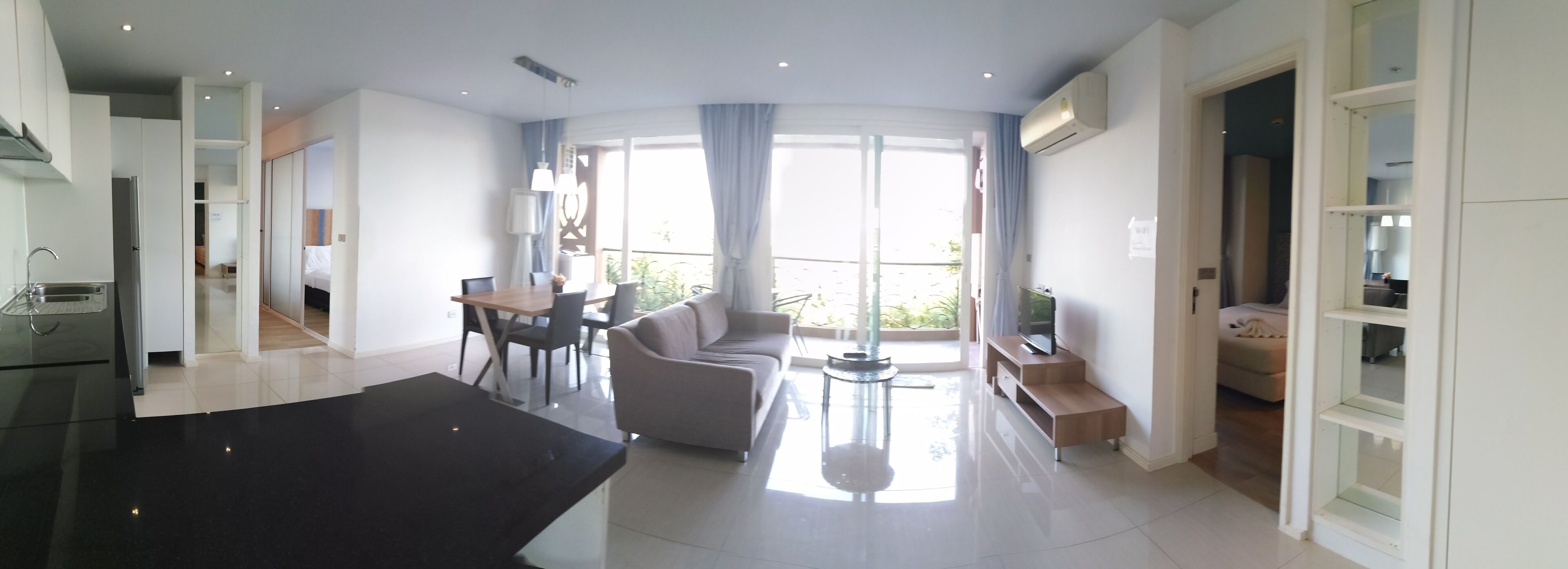 Family Suite, 2 Bedrooms, City View | Living room | 32-inch LED TV with cable channels, TV