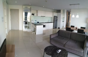 Family Suite, 2 Bedrooms, City View | Living area | 32-inch LED TV with cable channels, TV - Atlantis Condo (Pattaya)
