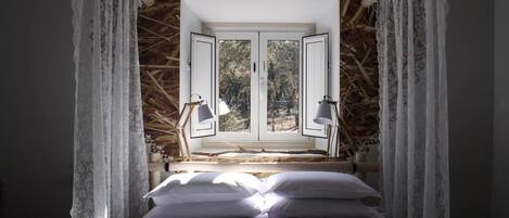 Charming Room | 2 bedrooms, minibar, in-room safe, individually decorated