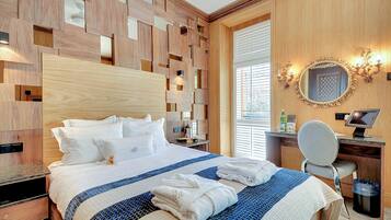 Double Room | Minibar, in-room safe, desk, iron/ironing board