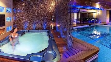 Indoor pool, open 8:00 AM to 9:00 PM, pool loungers