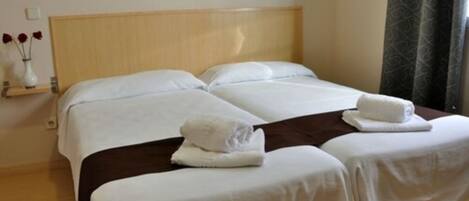 Standard Double Room, Shared Bathroom | Blackout drapes, iron/ironing board, free cribs/infant beds, free WiFi