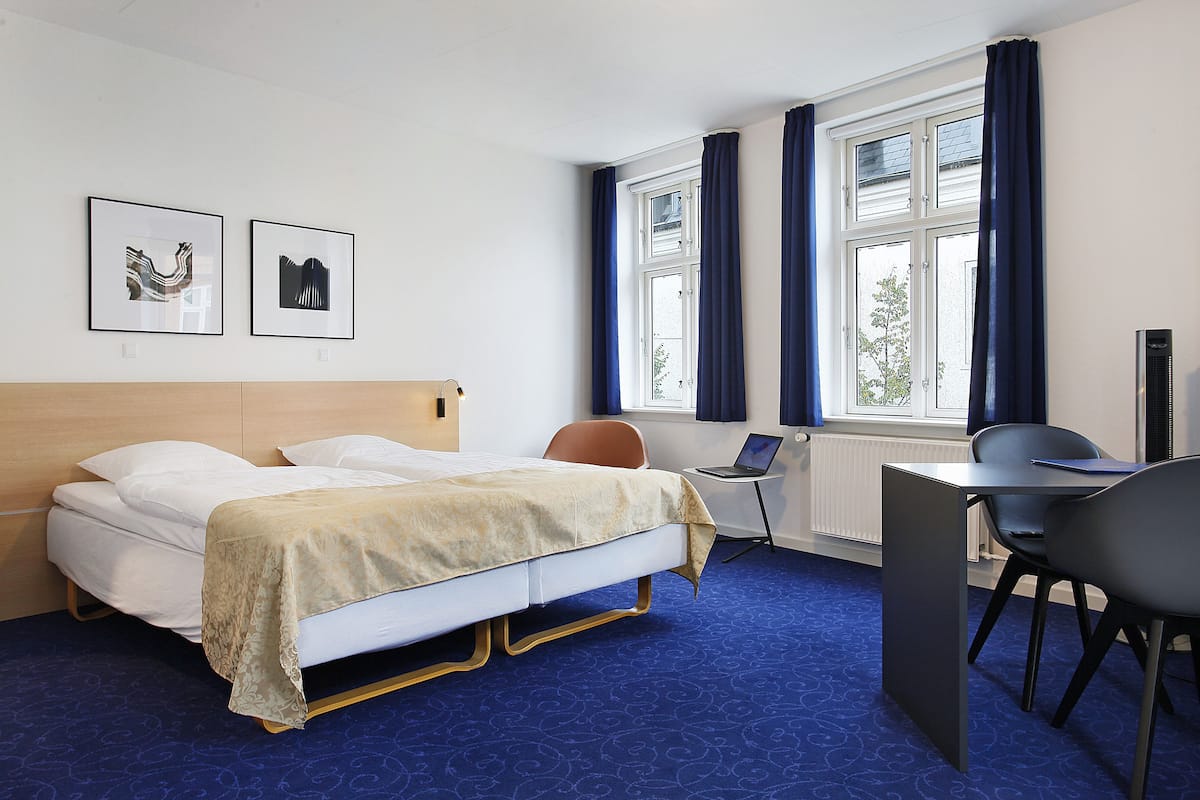 Suite Junior, 1 trĂšs grand lit, vue ville