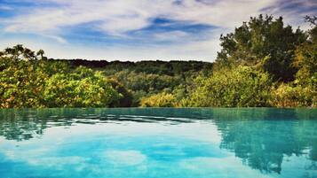 Seasonal outdoor pool, an infinity pool