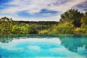 Seasonal outdoor pool, an infinity pool