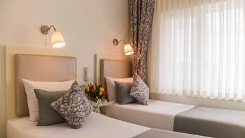 Roupas de cama premium, ferros/tábuas de passar roupa, Wi-Fi de cortesia