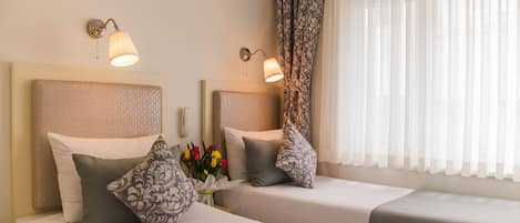 Ropa de cama de alta calidad y tabla de planchar con plancha