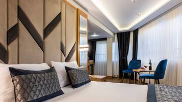 Deluxe Room | Premium bedding, minibar, in-room safe, desk