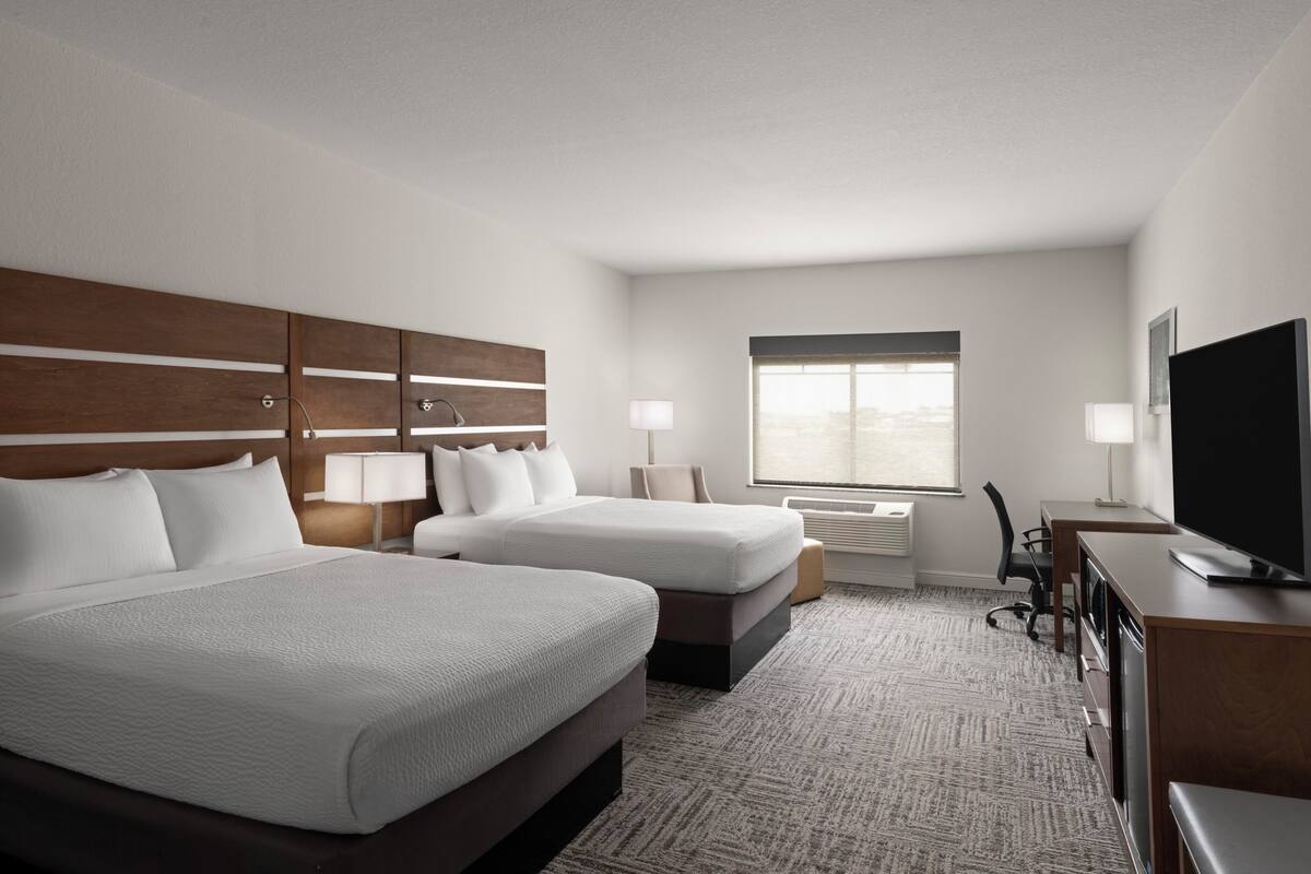 Pillowtop beds, desk, laptop workspace, blackout drapes