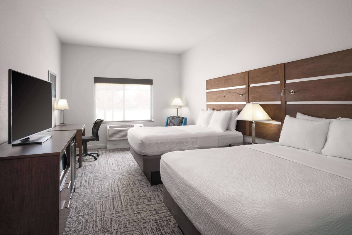 standard room, 2 queen beds, non smoking, refrigerator & microwave | pillow-top beds, desk, laptop workspace, blackout curtains