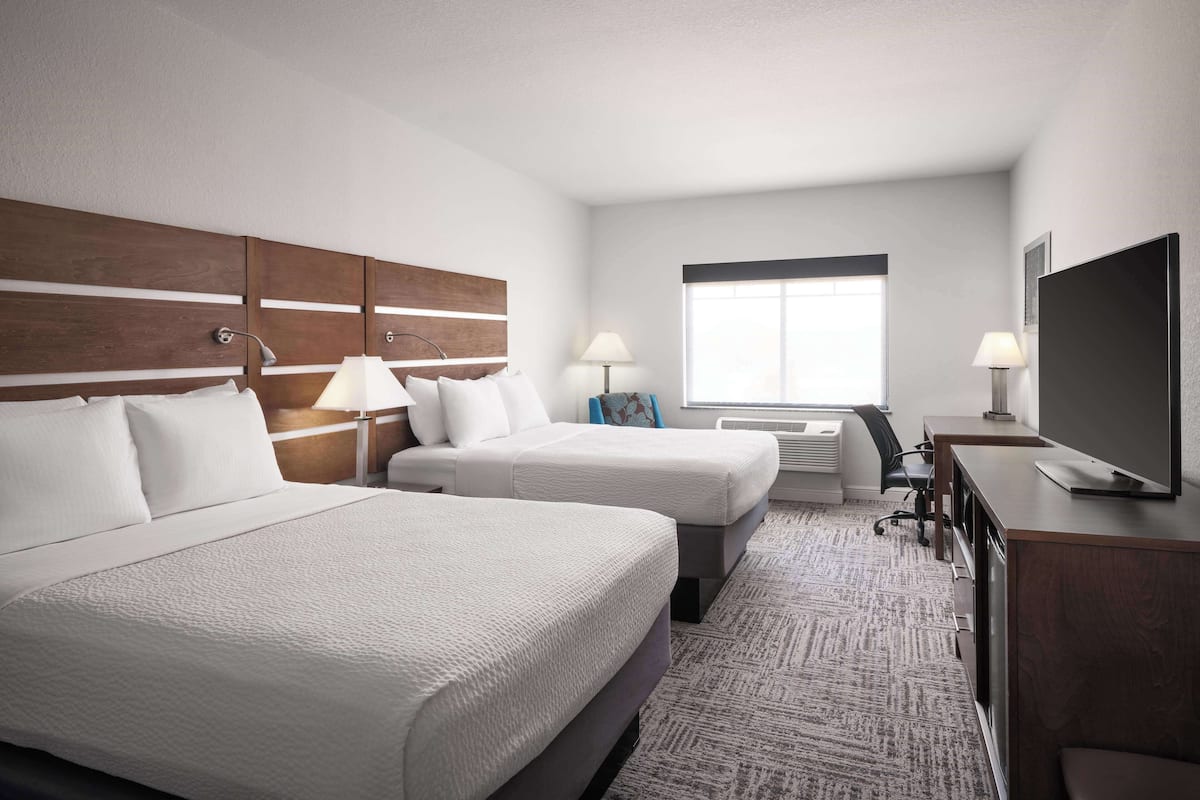 Standard Room, 2 Queen Beds, Non Smoking (Shower Only) | Pillow-top beds, desk, laptop workspace, blackout curtains