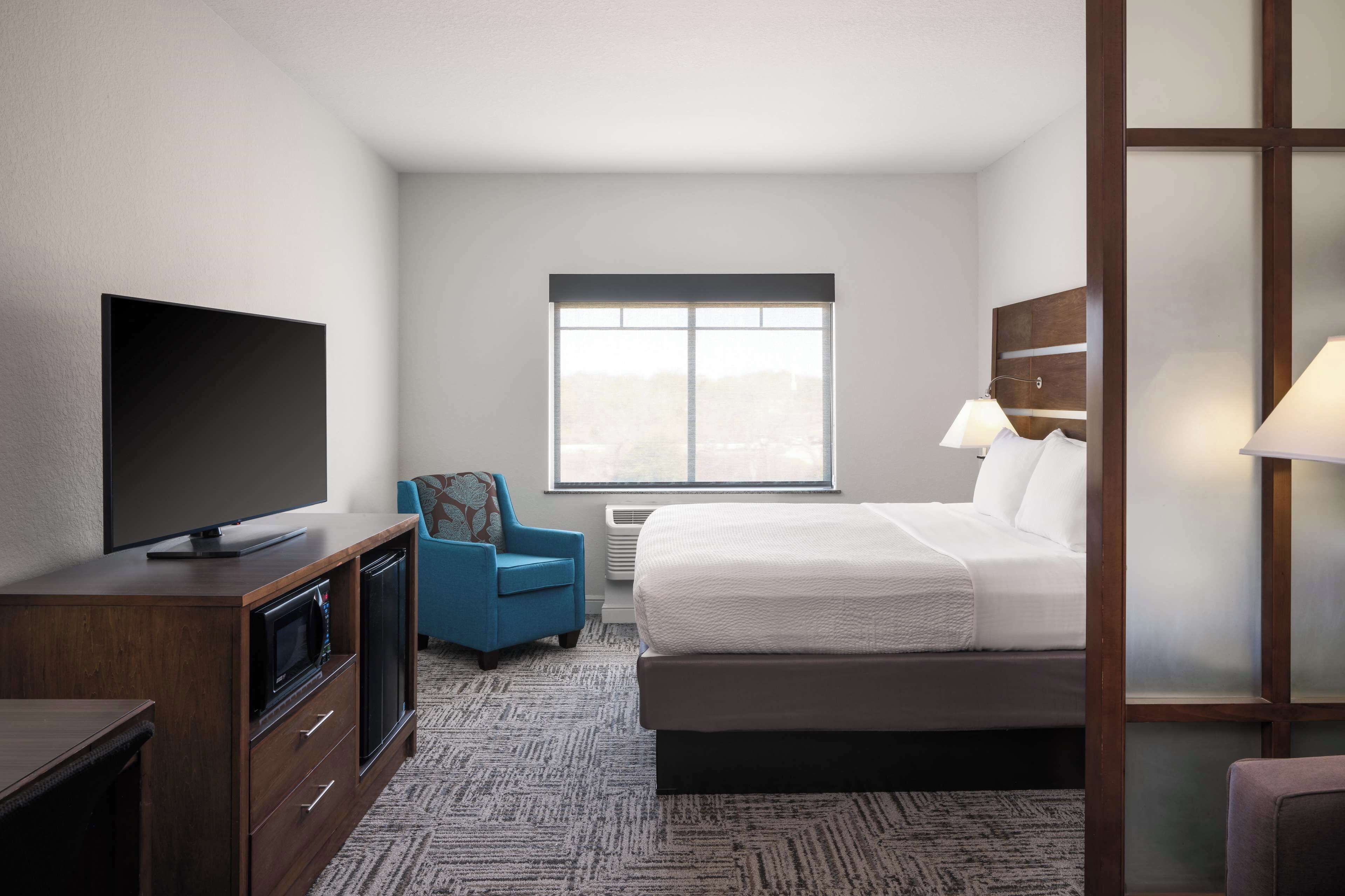 suite, 1 king bed, non smoking (shower only;with sofabed) | pillow-top beds, desk, laptop workspace, blackout curtains