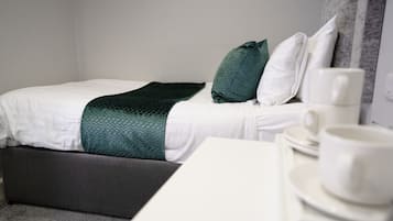 Family Triple Room | Iron/ironing board, free WiFi, bed sheets