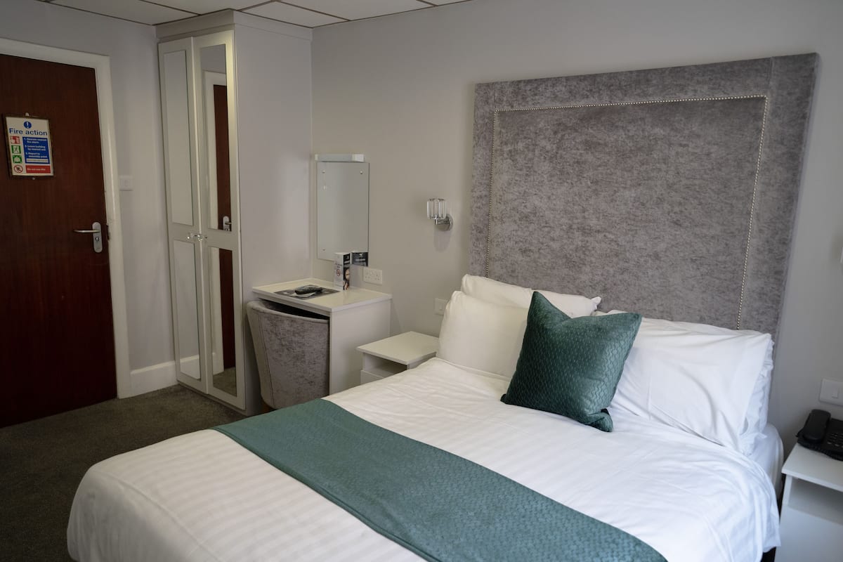 Familie driepersoonskamer | 1 slaapkamer, een strijkplank/strijkijzer, gratis wifi, beddengoed