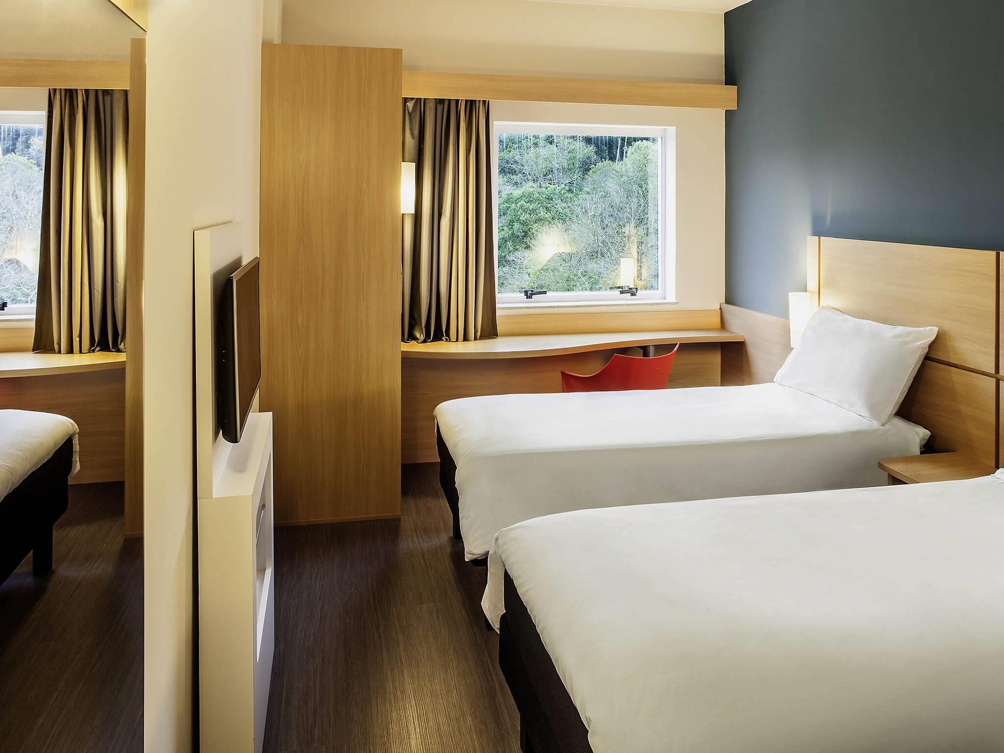 Standardlejlighed - 2 enkeltsenge | Minibar, gratis Wi-Fi, sengetøj