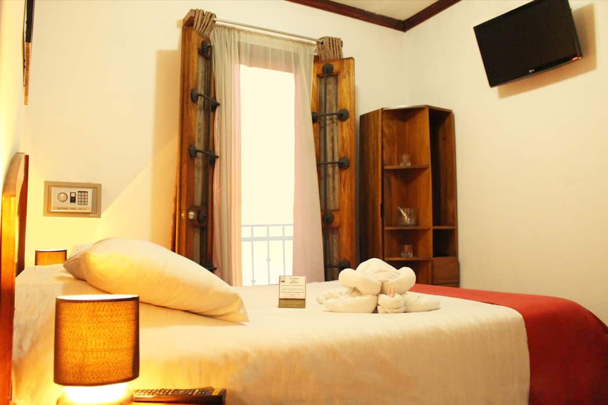 Superior Balcony Queen | Premium bedding, in-room safe, iron/ironing board, free WiFi