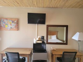 Tabla de planchar con plancha, wifi gratis y ropa de cama 