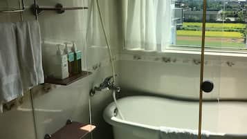 Panoramic Quadruple Room, 1 Bedroom, Bathtub, Tower | Deep-soaking bathtub