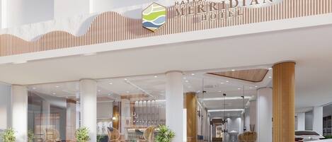 A modern hotel entrance with a prominent sign reading "HATYAI MERRIDIAN HOTEL".