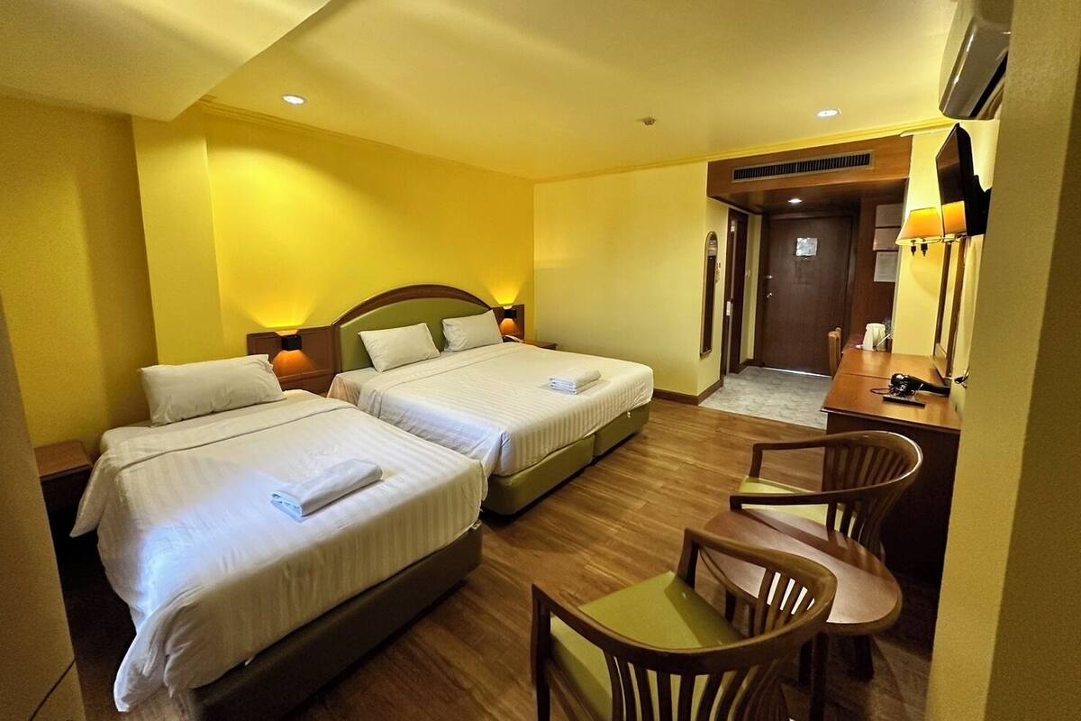 Family Triple Room, 1 Bedroom | Minibar, desk, free WiFi, bed sheets