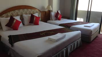 Family Triple Room, 1 Bedroom | Minibar, desk, free WiFi, bed sheets