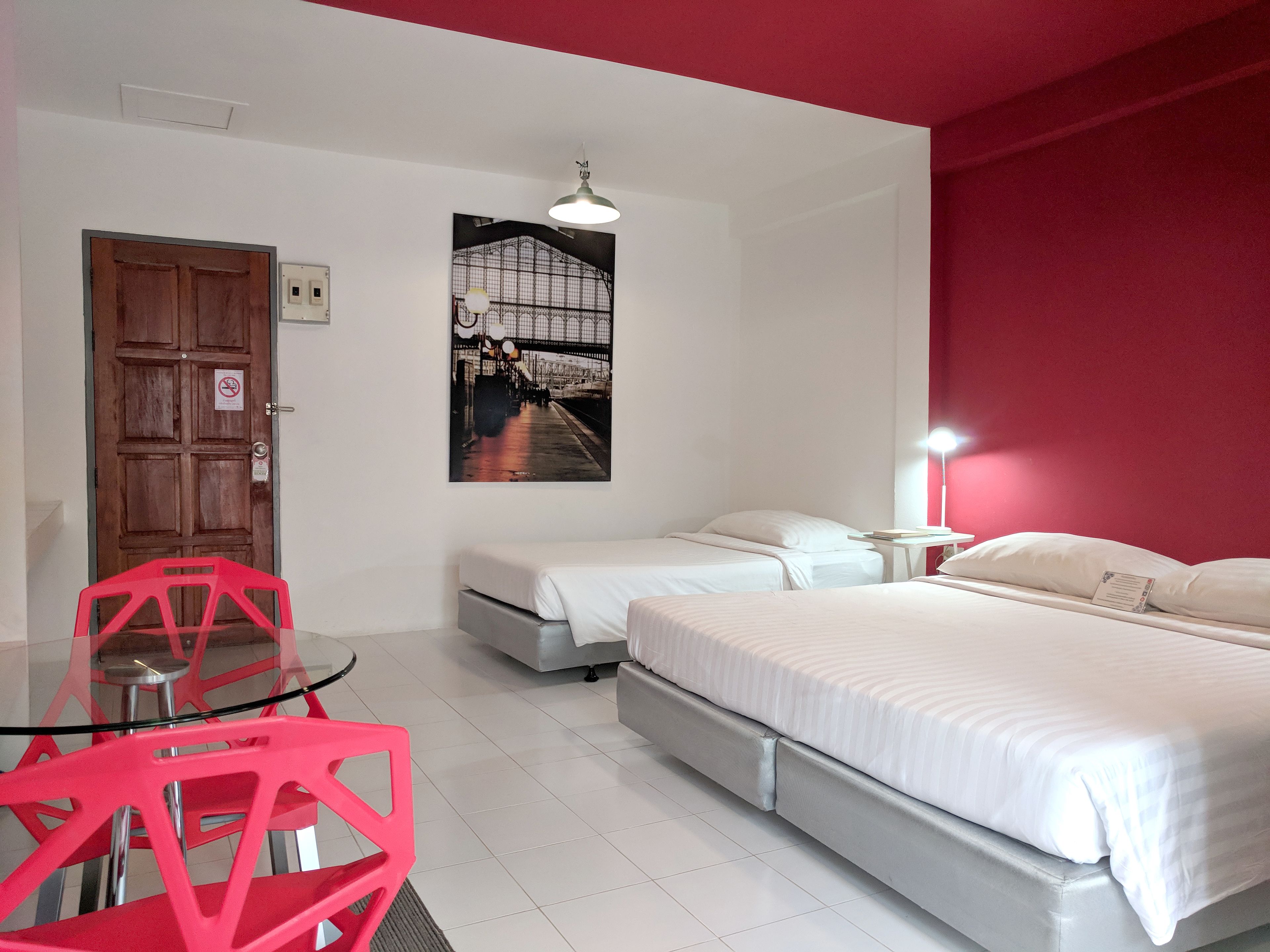 Standard Triple Room, 1 Bedroom, City View | Desk, free wired Internet, bed sheets