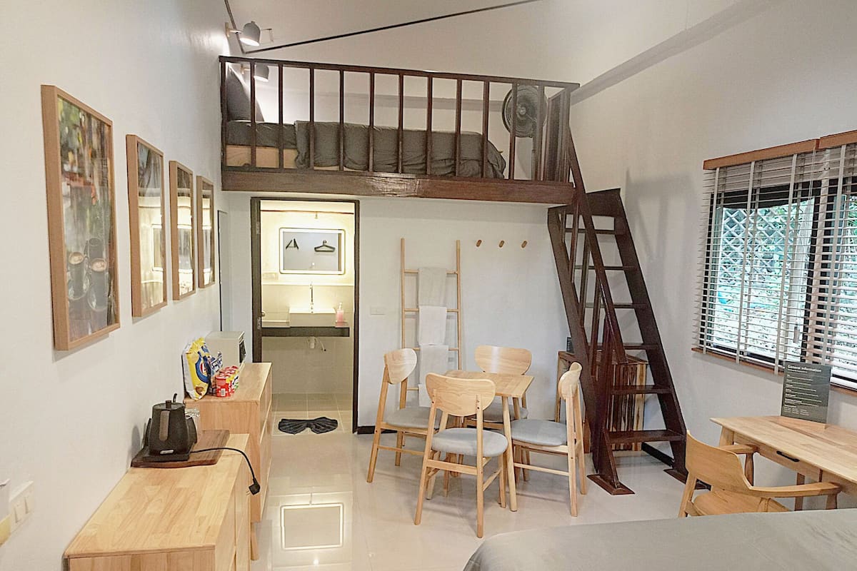 Chambre Familiale (Deluxe Family Room) | Minibar, coffres-forts dans les chambres, rideaux occultants